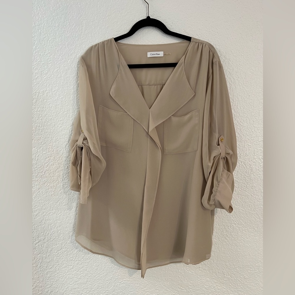 Beautiful tan color pullover blouse